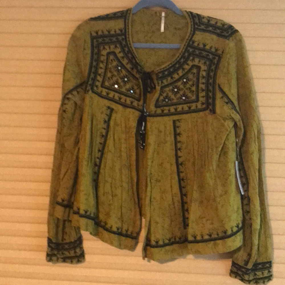 Free People Green w/black embroidering shirt.